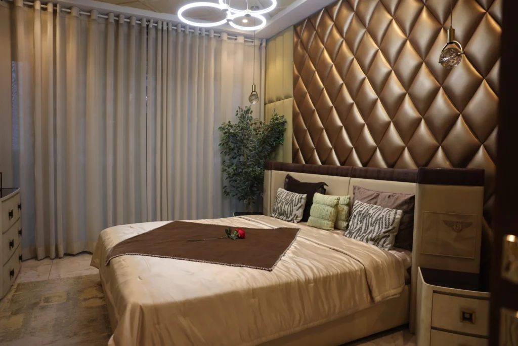 Modern luxury interior lounge with ambient lighting at Goldcrest Views Islamabad